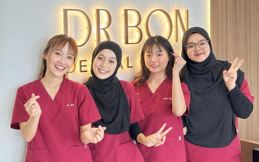 A team of coworkers wearing red uniform from Medipro Scrubs